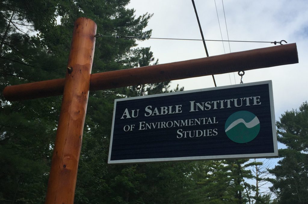 A picture of the sign for the Au Sable Institute just outside the Institute in Mancelona, Michigan.