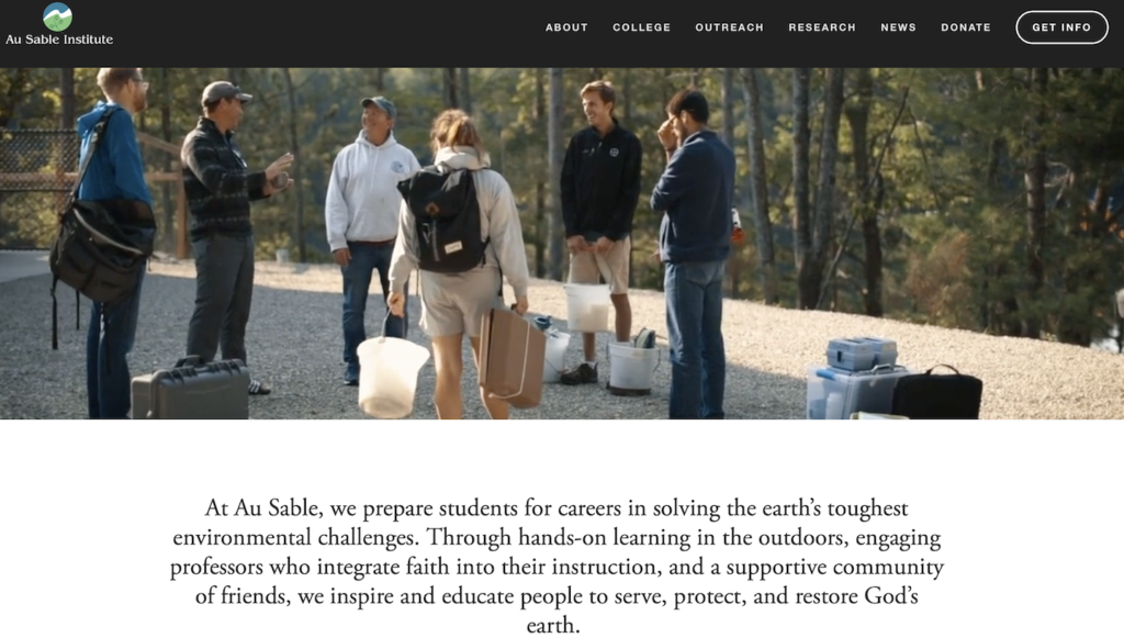 Shows home page of Au Sable website with photo of instructor with students preparing to do learning in woods